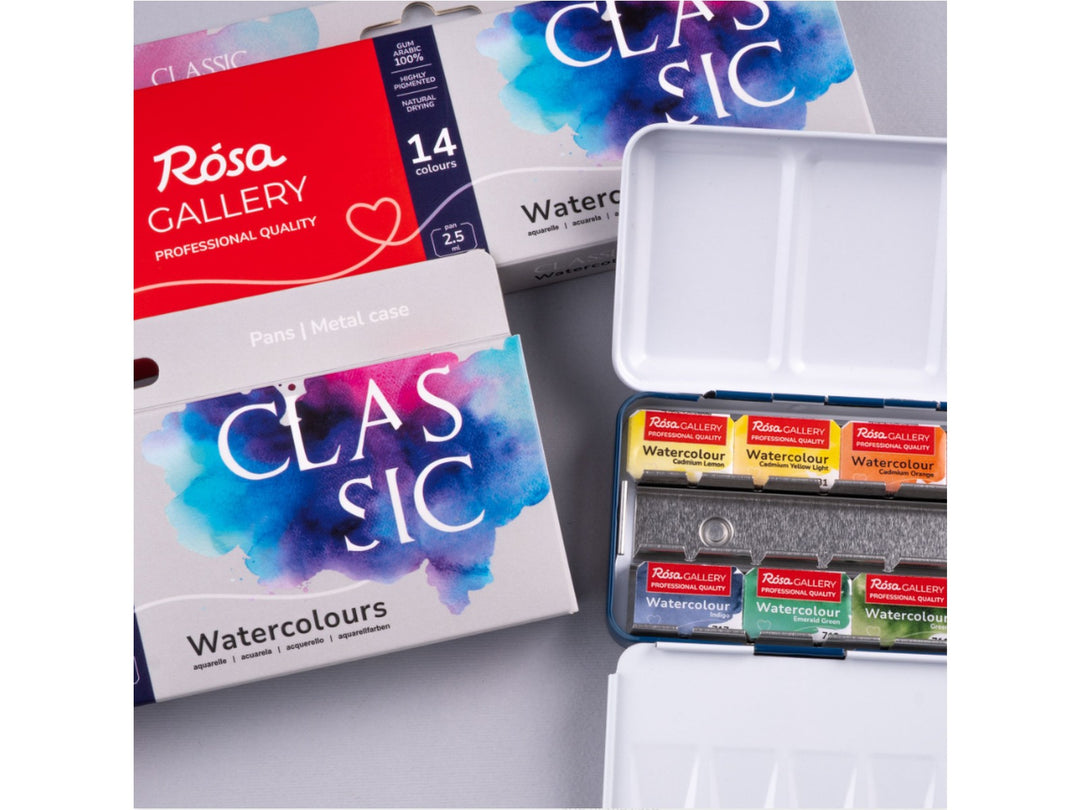 Lifestyle image of the ROSA Gallery Classic Watercolour Set featuring updated Classic Collection packaging, a metal watercolour case with professional watercolour pans, integrated mixing palette and curated artist colours for painting, sketching and illustration