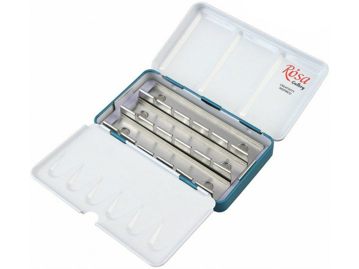 ROSA Gallery Turquoise metal watercolour case opened to reveal space for 12 full pans, featuring removable metal pan holders, integrated mixing wells in the lid and fold-out palette sections for portable watercolour painting