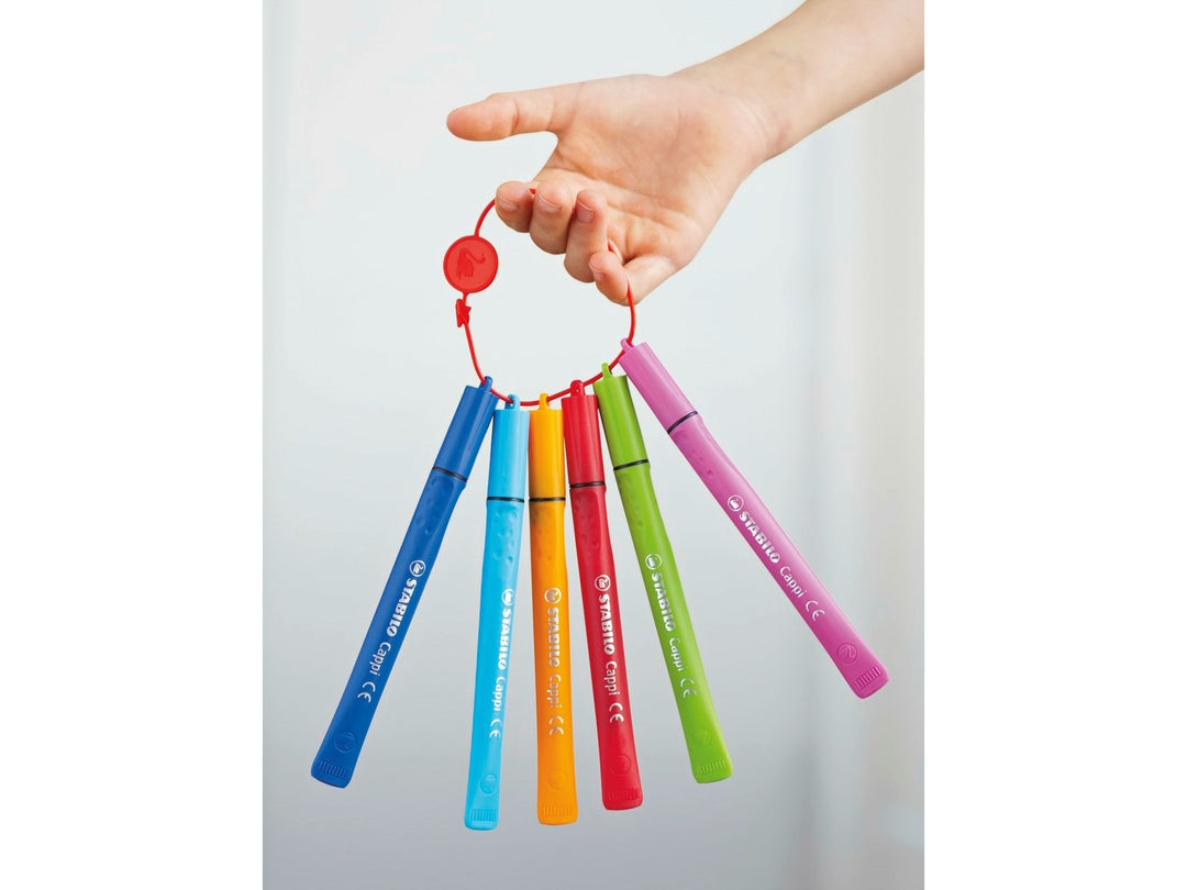 STABILO Cappi felt-tip pens in assorted bright colours threaded onto the practical red cap ring, demonstrating how the looped caps keep the pens together