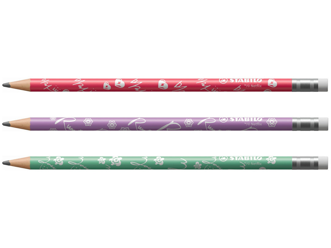 Three STABILO KPop Demon Hunters HB graphite pencils with erasers displayed horizontally, featuring red, purple and green special-edition character-inspired designs