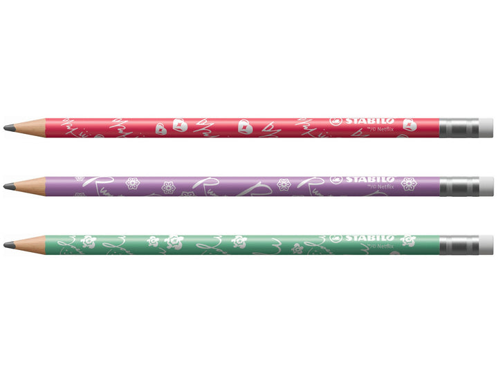 Three STABILO KPop Demon Hunters HB graphite pencils with erasers displayed horizontally, featuring red, purple and green special-edition character-inspired designs