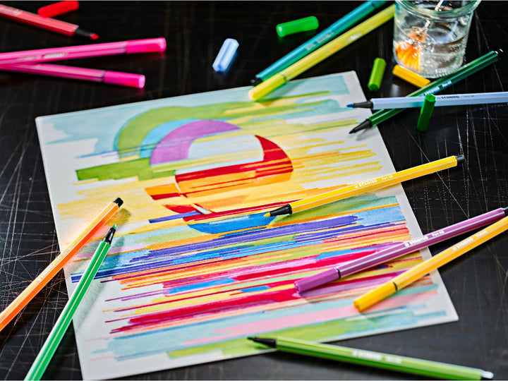 STABILO Pen 68 felt-tip pens arranged around a colourful abstract drawing, showcasing bright assorted colours for sketching, colouring and creative artwork
