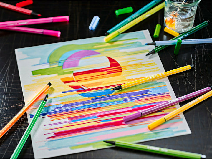 STABILO Pen 68 felt-tip pens arranged around a colourful abstract drawing, showcasing bright assorted colours for sketching, colouring and creative artwork