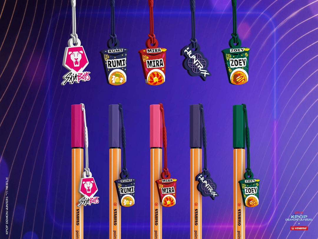 STABILO point 88 KPop Demon Hunters fineliner pens displayed with five detachable collectable charms featuring ramyeon cup and band logo designs on a purple background