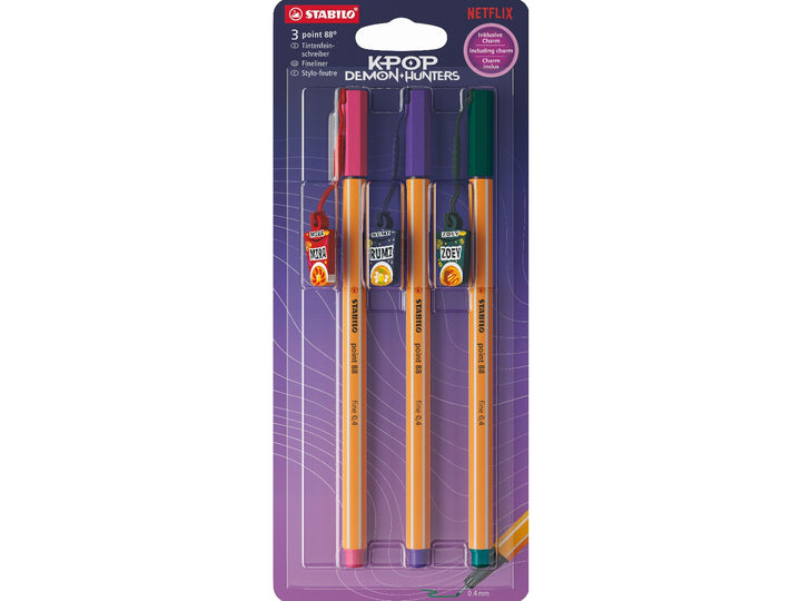 STABILO point 88 KPop Demon Hunters set of 3 fineliner pens in Light Pink, Violet and Pine Green displayed in special-edition purple retail packaging with detachable ramyeon cup charms