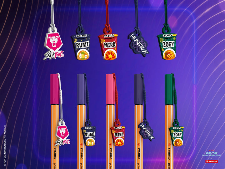 STABILO point 88 KPop Demon Hunters fineliner pens displayed with five detachable collectable charms featuring Rumi, Mira and Zoey ramyeon cups plus HUNTR/X and Saja Boys designs