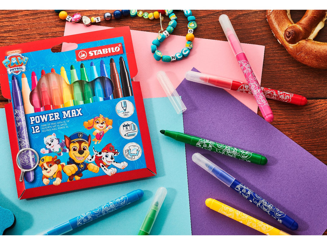 STABILO power max PAW Patrol Wallet of 12 felt-tip pens displayed with colourful uncapped markers on a creative desk with coloured paper and craft accessories