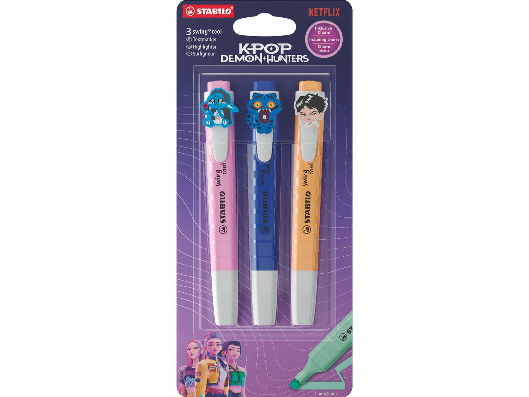 Pink STABILO swing cool highlighters displayed on a cork desk mat, with one uncapped to show the chisel tip and broad and fine pink highlighting lines on note paper