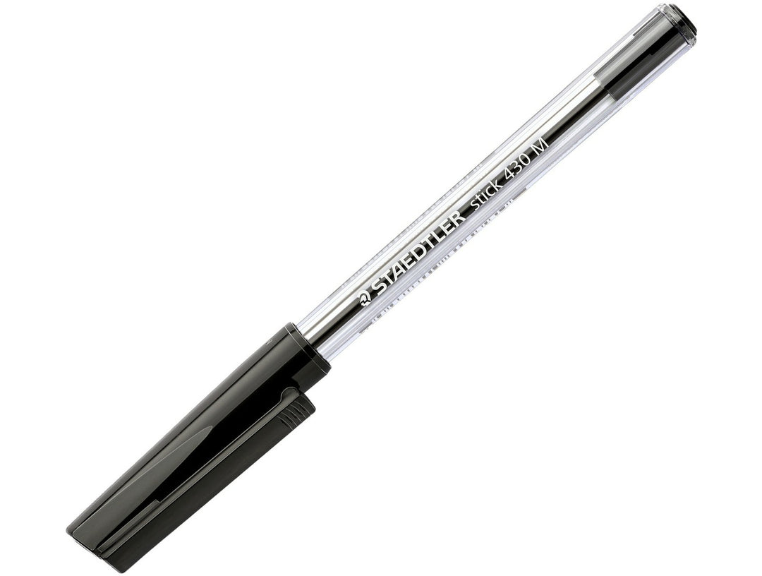 STAEDTLER Stick 430 ballpoint pen black medium tip with transparent barrel and cap detail shown diagonally