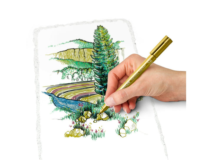 STAEDTLER Metallic Marker 8323 gold pen used for creative drawing and highlighting on paper with metallic effect