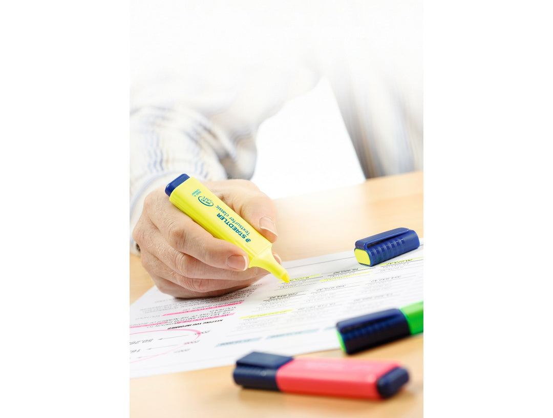 STAEDTLER Textsurfer Classic 364 yellow highlighter highlighting printed text on paper showing clear visibility and readability