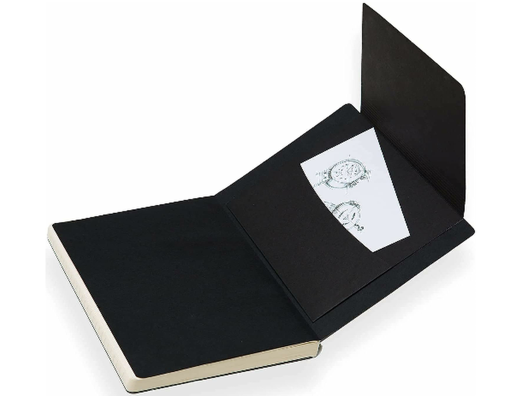 Stifflex artwork book open showing black inner cover with pocket and inserted card along with thick sketchbook pages