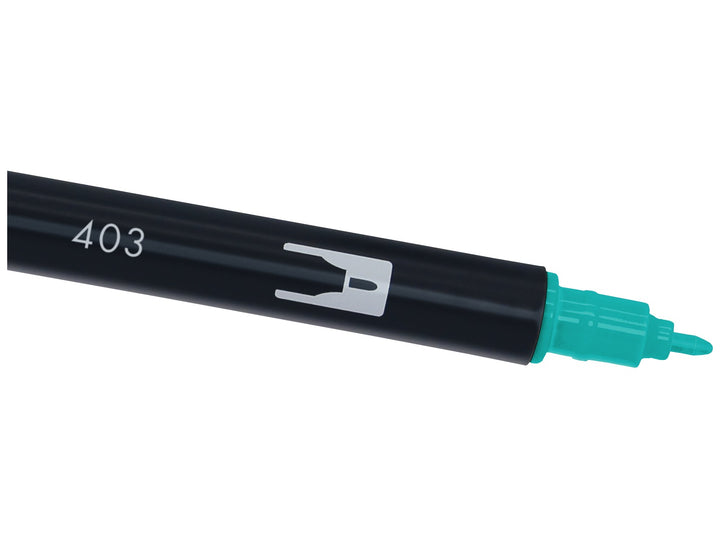 Close-up of the fine bullet tip on a Tombow ABT Dual Brush Pen in Bright Blue (403), designed for precise lines, outlines, lettering details, journaling, illustration and creative artwork.