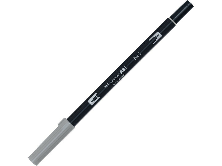 Tombow ABT Dual Brush Pen in Cool Grey 5 (N65) with dual-tip design, featuring a flexible brush tip and fine bullet tip for sketching, shading, hand lettering, illustration and monochrome artwork.