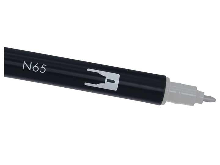 Close-up of the fine bullet tip on a Tombow ABT Dual Brush Pen in Cool Grey 5 (N65), designed for precise lines, outlines, lettering details, sketching, shading and monochrome illustration work.