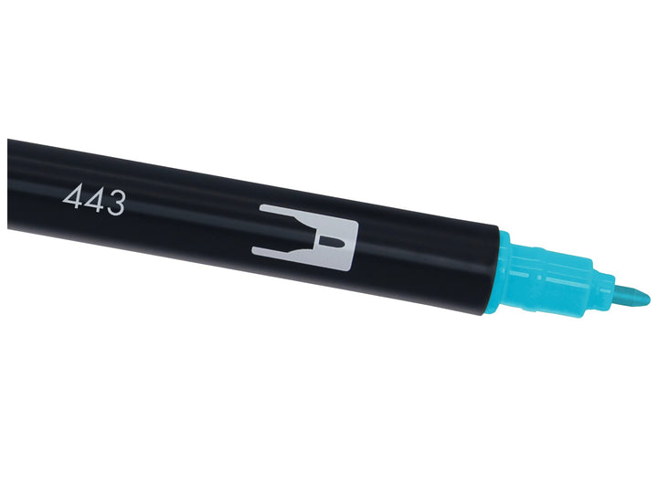 Close-up of the fine bullet tip on a Tombow ABT Dual Brush Pen in Turquoise (443), designed for precise lines, details, borders, graphics and creative lettering projects.