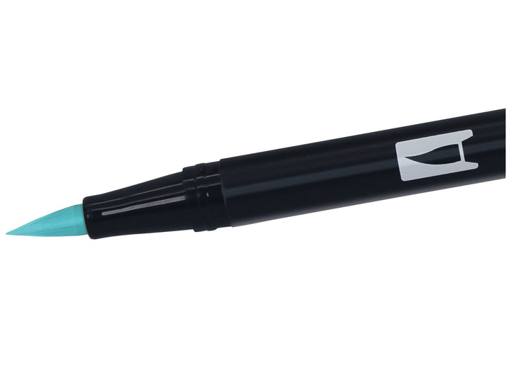 Close-up of the flexible brush tip on a Tombow ABT Dual Brush Pen in Process Blue (452), designed for creating variable line widths, hand lettering, illustration, colouring, journaling and watercolour-style effects.