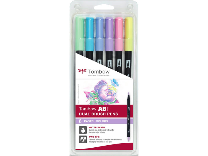 Tombow ABT Dual Brush Pen Pastel Colours Set of 6 in original retail packaging, featuring Pale Yellow (062), Mint (243), Process Blue (452), Mist Purple (553), Purple Sage (623) and Pink (723), with dual brush and fine tips for hand lettering, colouring, journaling and illustration.