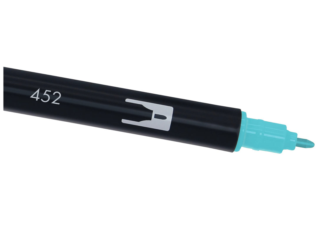 Close-up of the fine bullet tip on a Tombow ABT Dual Brush Pen in Process Blue (452), designed for precise lines, outlines, lettering details, journaling, illustration and creative artwork.