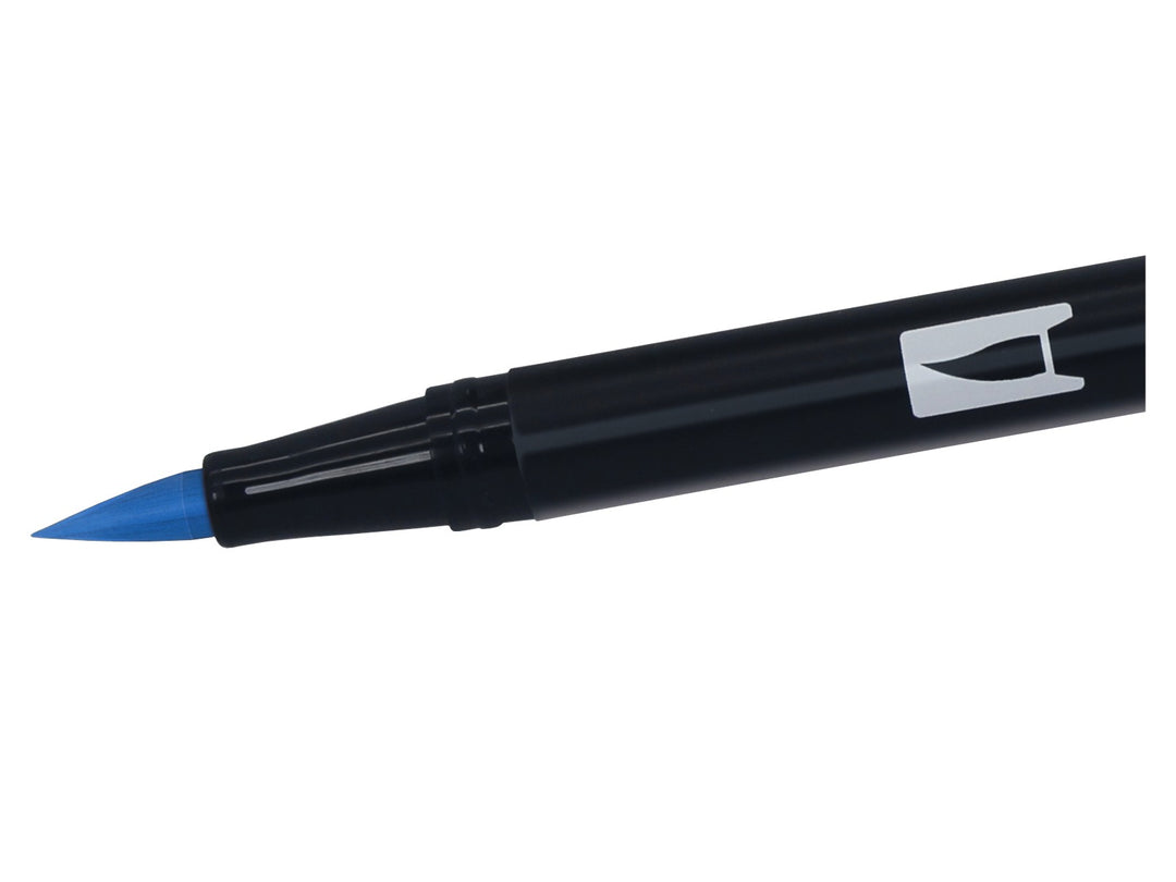 Close-up of the flexible brush tip on a Tombow ABT Dual Brush Pen in Ultramarine (555), designed for creating variable line widths, brush lettering, illustration, colouring and watercolour-style effects.