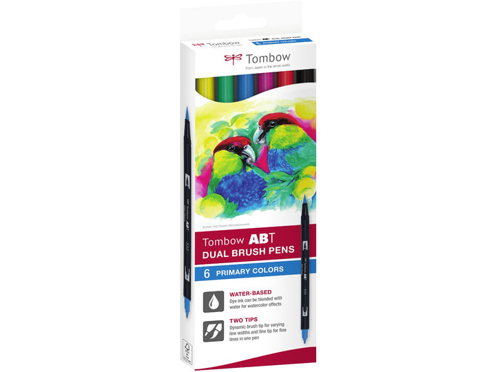 Tombow ABT Dual Brush Pen Primary Colours Set of 6 in original retail packaging, featuring Black (N15), Process Yellow (055), Green (296), Cobalt Blue (535), Rhodamine Red (725) and Carmine (845), with dual brush and fine tips for hand lettering, colouring, illustration and creative projects.