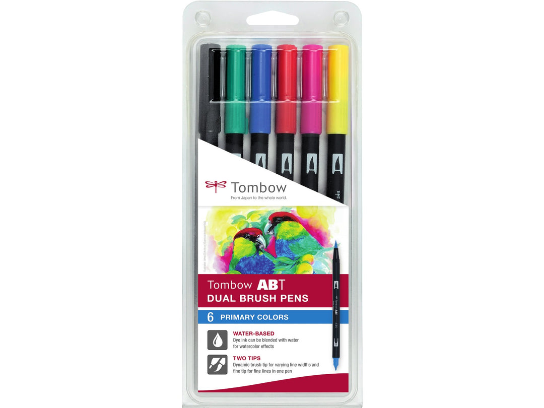 Tombow ABT Dual Brush Pen Primary Colours Set of 6 blister pack in original retail packaging, featuring Black (N15), Process Yellow (055), Green (296), Cobalt Blue (535), Rhodamine Red (725) and Carmine (845), with dual brush and fine tips for hand lettering, colouring, illustration and creative projects.