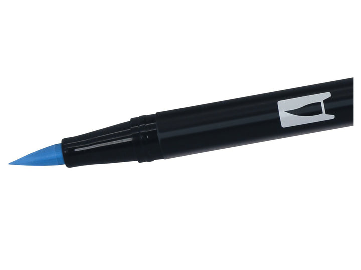 Close-up of the flexible brush tip on a Tombow ABT Dual Brush Pen in Cobalt Blue (535), designed for creating variable line widths, hand lettering, illustration, colouring, journaling and watercolour-style effects.