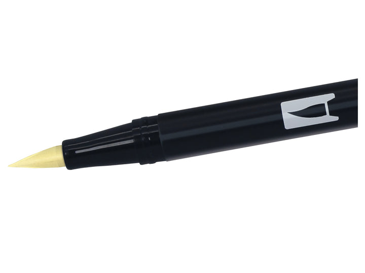 Close-up of the flexible brush tip on a Tombow ABT Dual Brush Pen in Light Sand (990), designed for creating variable line widths, portrait illustration, colouring, hand lettering and watercolour-style effects.