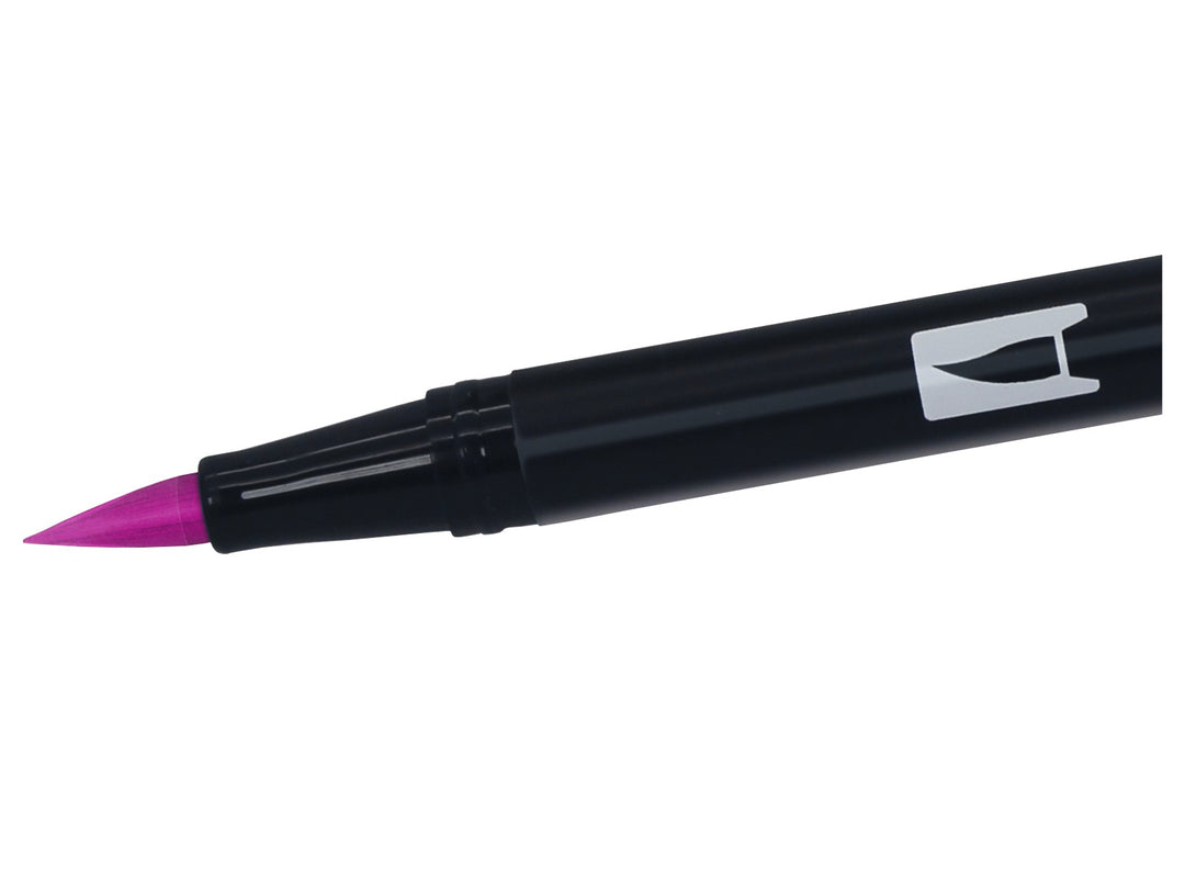 Close-up of the flexible brush tip on a Tombow ABT Dual Brush Pen in Deep Magenta (685), designed for creating variable line widths, hand lettering, illustration, colouring and watercolour-style effects.