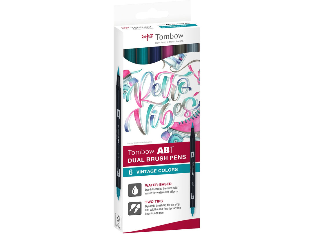 Tombow ABT Dual Brush Pen Vintage Colours Set of 6 in original retail packaging, featuring Warm Grey 8 (N49), Cool Grey 8 (N52), Jade Green (379), Tiki Teal (407), Jet Blue (569) and Mauve (817), with dual brush and fine tips for hand lettering, illustration, journaling and creative projects.