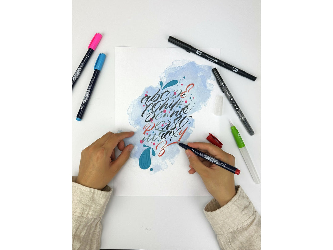 Hand lettering artwork created using Tombow Fudenosuke colour brush pens, demonstrating variable line widths, vibrant pigment ink and brush lettering techniques