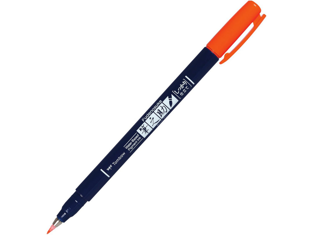 Tombow Fudenosuke orange brush pen with firm elastic brush tip and water-based pigment ink for hand lettering, calligraphy, illustration and creative journaling