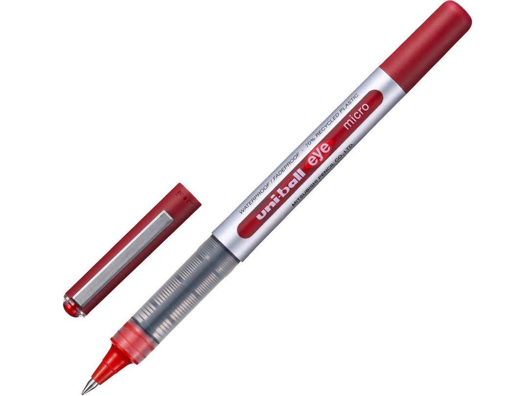 Red uni-ball Eye Micro UB-150 rollerball pen shown uncapped with cap removed, featuring a visible ink reservoir, precision 0.5mm tip and smooth liquid Super Ink technology