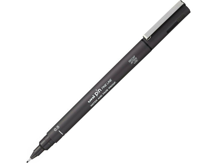uni PIN Dark Grey fineliner drawing pen with a 0.5mm tip, shown diagonally on a white background and featuring archival-quality dark grey pigment ink for sketching, illustration and creative artwork