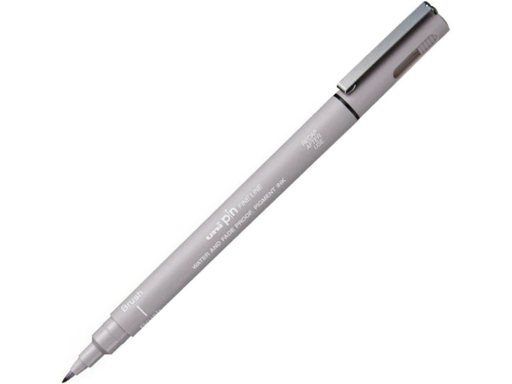 uni PIN Light Grey brush pen shown diagonally on a white background, featuring a flexible brush tip and archival-quality light grey pigment ink for sketching, illustration, hand lettering and expressive artwork