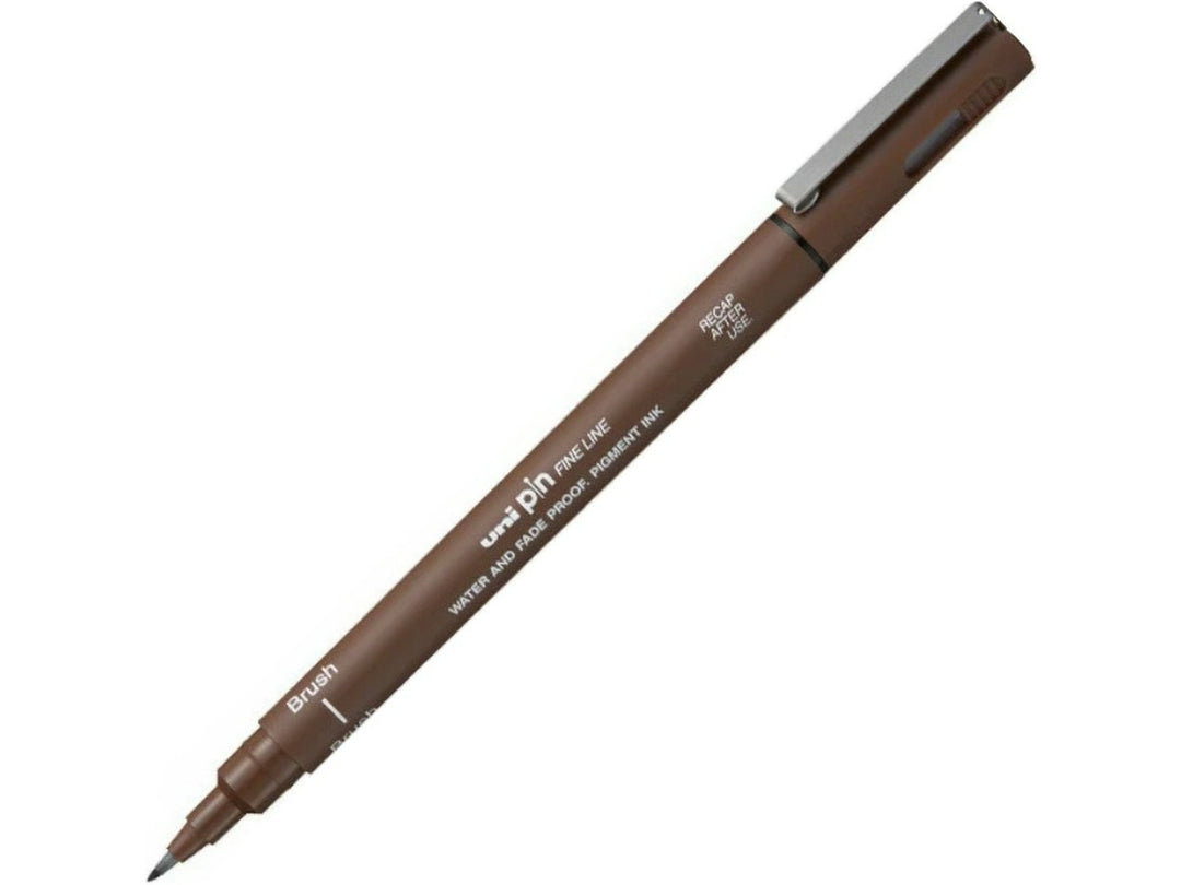 uni PIN Sepia brush pen shown diagonally on a white background, featuring a flexible brush tip and archival-quality sepia pigment ink for sketching, illustration, hand lettering and expressive artwork
