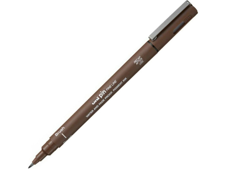 uni PIN Sepia brush pen shown diagonally on a white background, featuring a flexible brush tip and archival-quality sepia pigment ink for sketching, illustration, hand lettering and expressive artwork