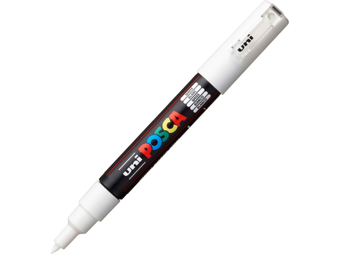 White uni POSCA PC-1M extra fine water-based paint marker shown diagonally with cap attached, featuring a precision 0.7mm bullet tip for detailing, lettering and creative artwork