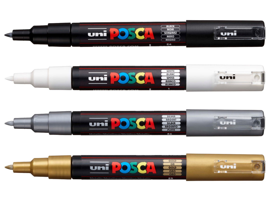 uni POSCA PC-1MR extra fine water-based paint marker set of 4 including Black, White, Silver and Gold metallic colours arranged in a flat lay display