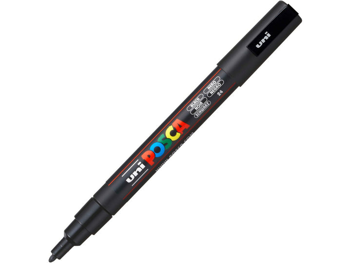 Black uni POSCA PC-3M fine water-based paint marker shown diagonally with cap removed, featuring a 0.9–1.3mm bullet tip for outlining, lettering, illustration and creative projects