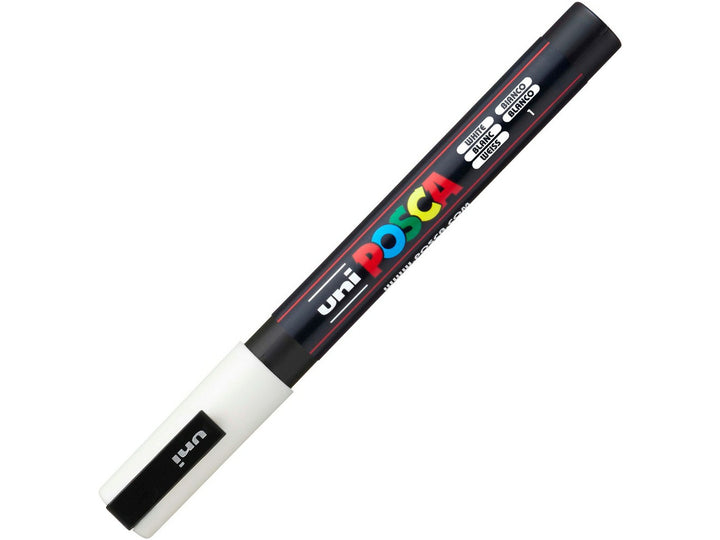 uni POSCA PC-3M white water-based paint marker shown with cap fitted, featuring a fine 0.9–1.3mm bullet tip for lettering, illustration and creative projects