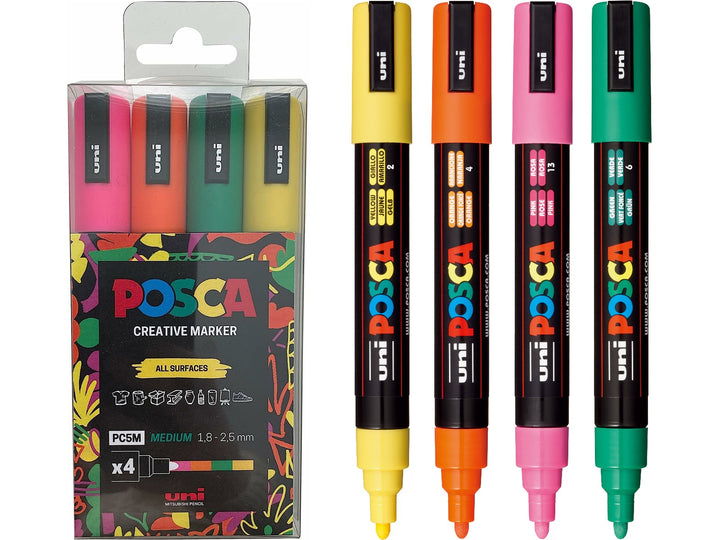 uni POSCA PC-5M Assorted Set of 4 paint markers in Yellow, Orange, Pink and Green, displayed uncapped beside the retail pack