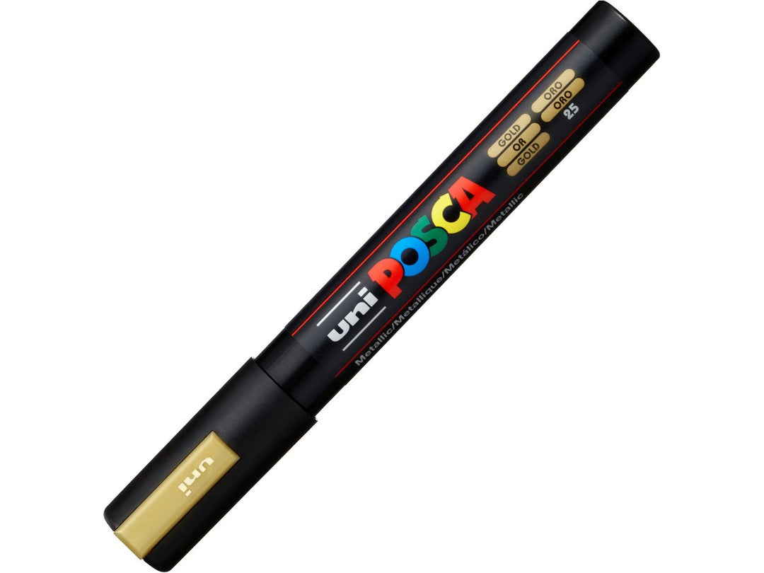 uni POSCA PC-5M gold water-based paint marker shown with cap fitted, featuring a medium 1.8–2.5mm bullet tip and metallic gold pigment ink for lettering, illustration, signage and creative projects
