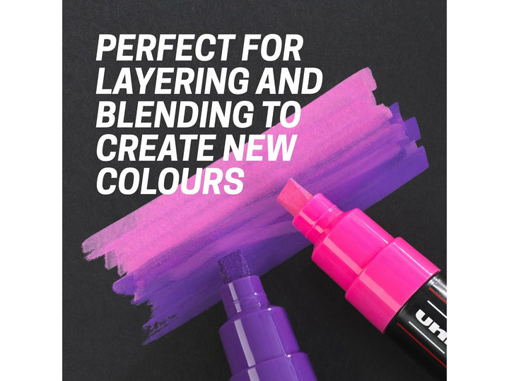 Pink and violet uni POSCA PC-8K paint markers demonstrating layering and blending with broad 8mm chisel tips to create new colours