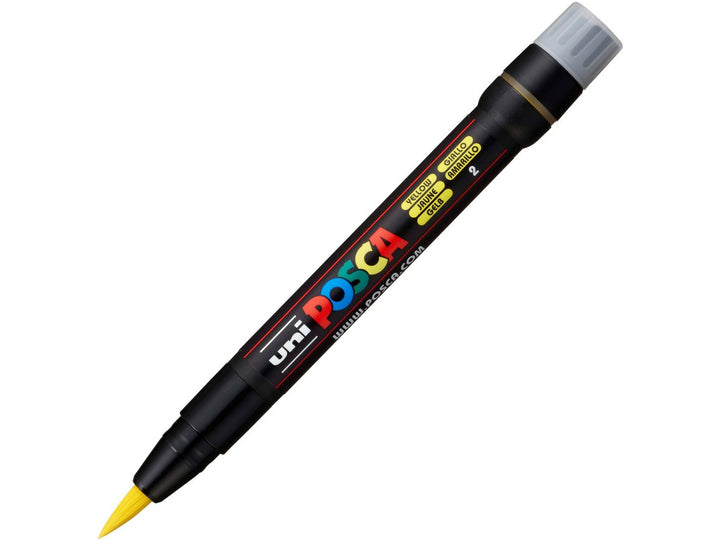 Yellow uni POSCA PCF-350 Brush Tip Paint Marker shown uncapped with flexible yellow brush tip and cap